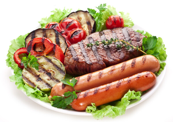 盤子內(nèi)的烤肉與烤腸圖片