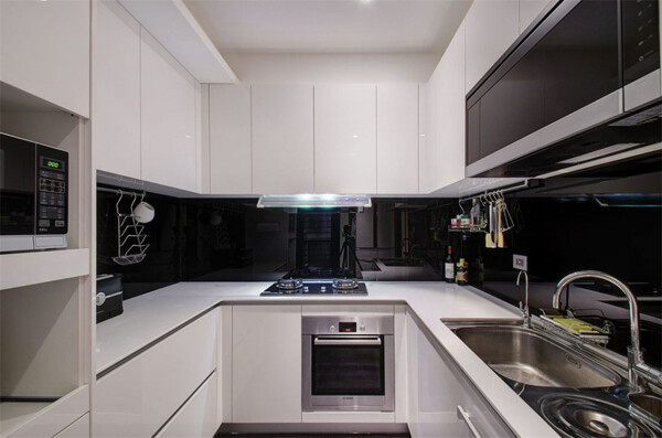 现代简约厨房白色壁柜室内装修效果图