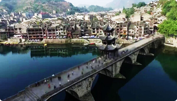 航拍贵州长远深山峡谷建筑群古亭清澈的河水风景视频