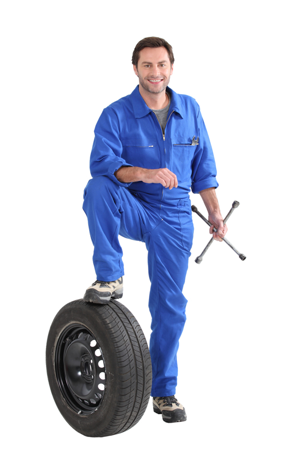 汽车维修工人与轮胎图片