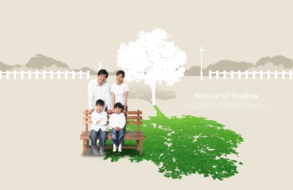 大树的绿色投影和长椅上的一家人