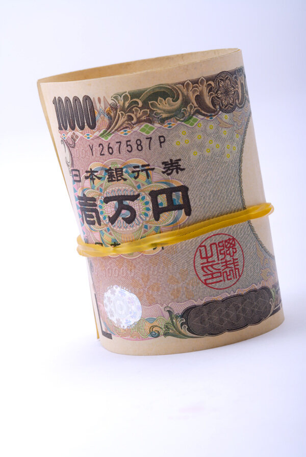 一卷捆好的日元图片