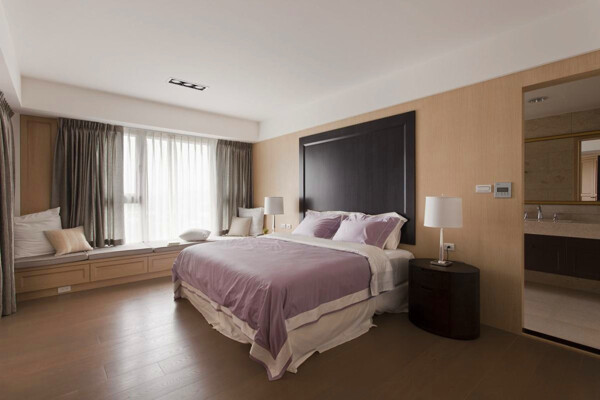 现代卧室藕粉色背景墙室内装修效果图