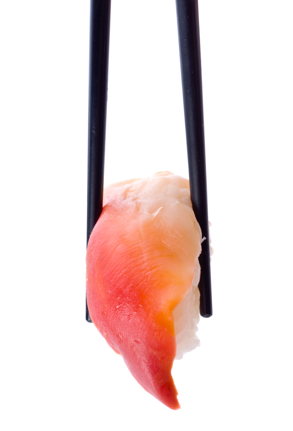 筷子夹寿司图片